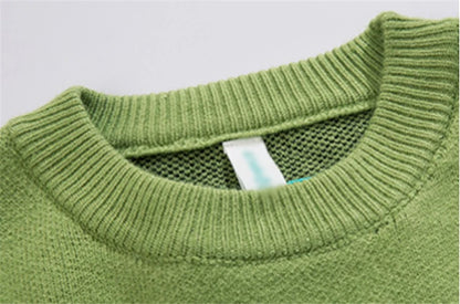 Suéter estilo dinosaurio